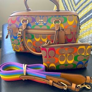 Coach satchel small pen mark on back of tag still looks new comes with wristlet